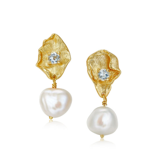 Pair of Awakened Time Fleur d’Or 18ct gold plated organic flower earrings with blue topaz center gems and freshwater pearl drops.