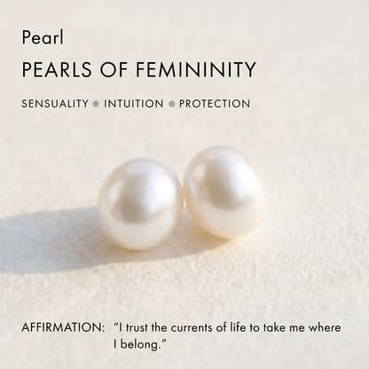 Awakened Time brand graphic featuring two luminous white freshwater pearls with text reading "Pearls of Femininity", key traits "Sensuality, Intuition, Protection", and the affirmation "I trust the currents of life to take me where I belong."