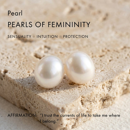 Feature card displaying natural freshwater pearls on a stone slab and describing pearls as the symbol of femininity, sensuality, intuition, and protection.