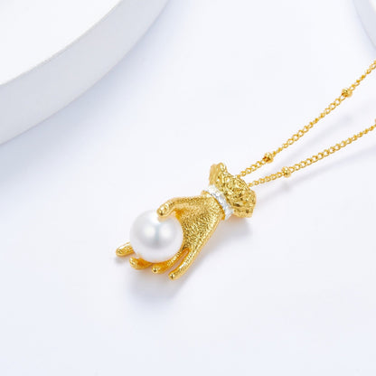 Pearl in Palm Necklace