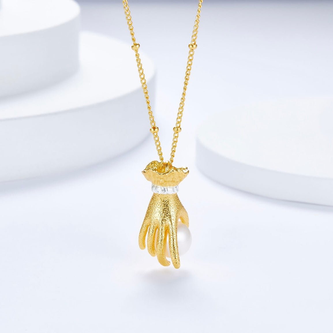 Pearl in Palm Necklace