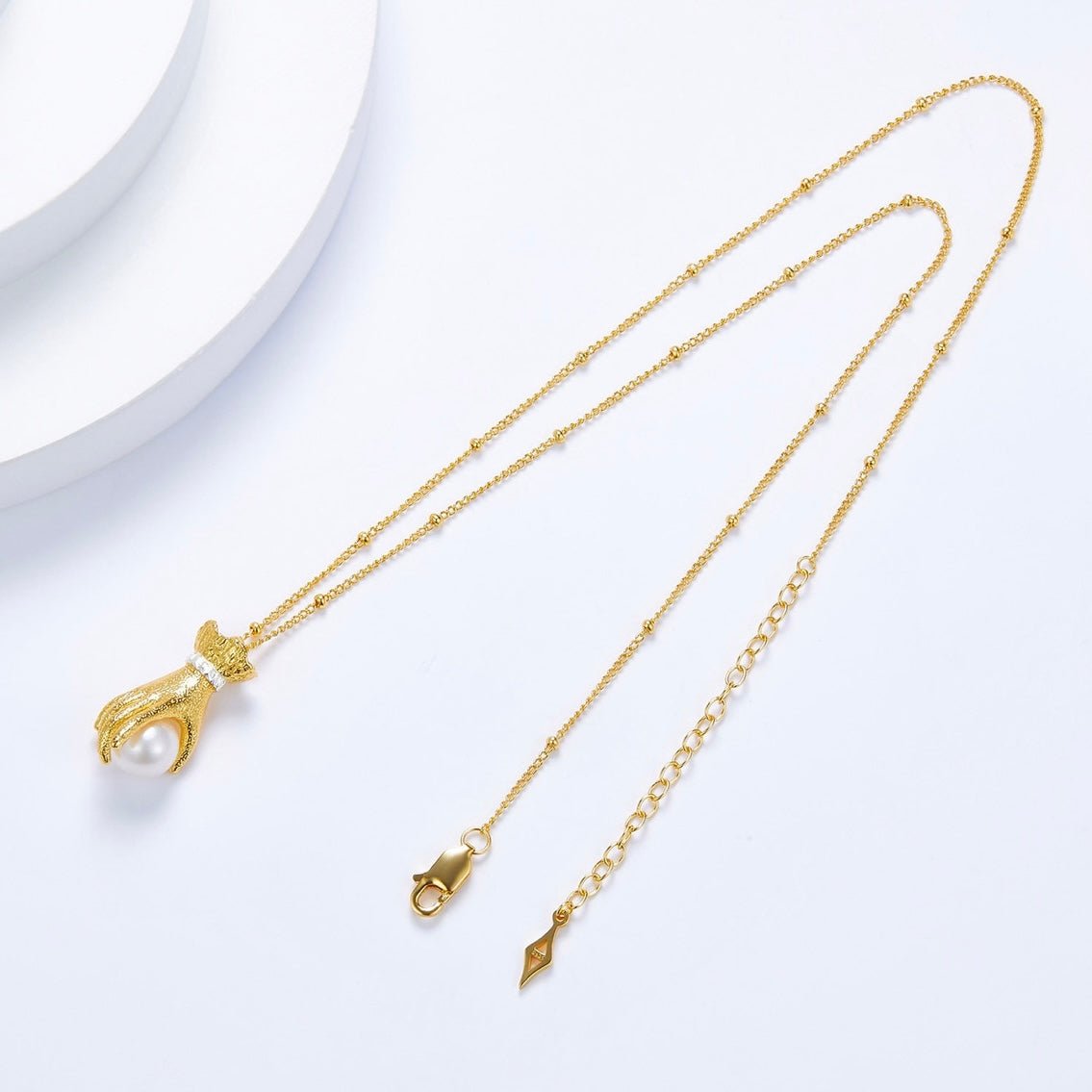 Pearl in Palm Necklace